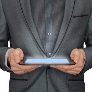 Entrepreneur holding a tablet.